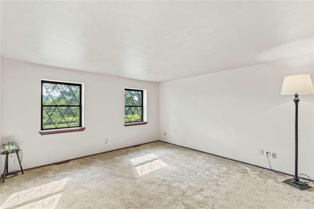 738 Beagle Club Road McDonald, PA 15057 - Photo 16 of 47 The primary bedroom suite hosts plenty of natural light and is spacious enough to fit your king sized bed.