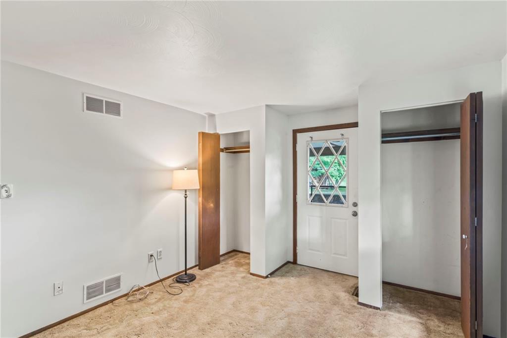 738 Beagle Club Road McDonald, PA 15057 - Photo 22 of 47 Bedroom number 2 has double closets and a walkout door to the covered side patio.