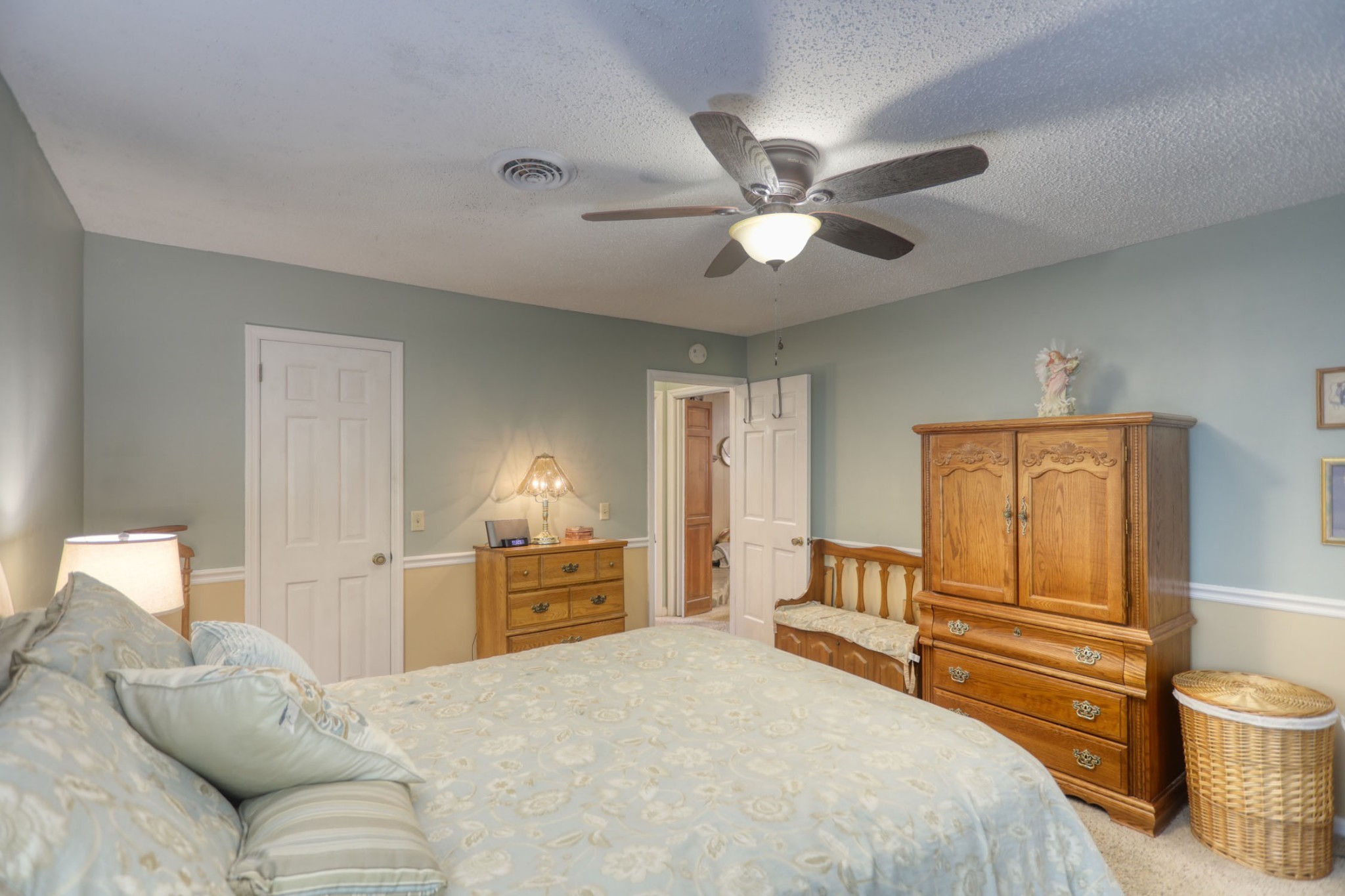 3517 Colony Point West Nashville, TN 37217 - Photo 14 of 34 a bedroom with a large bed and ceiling fan