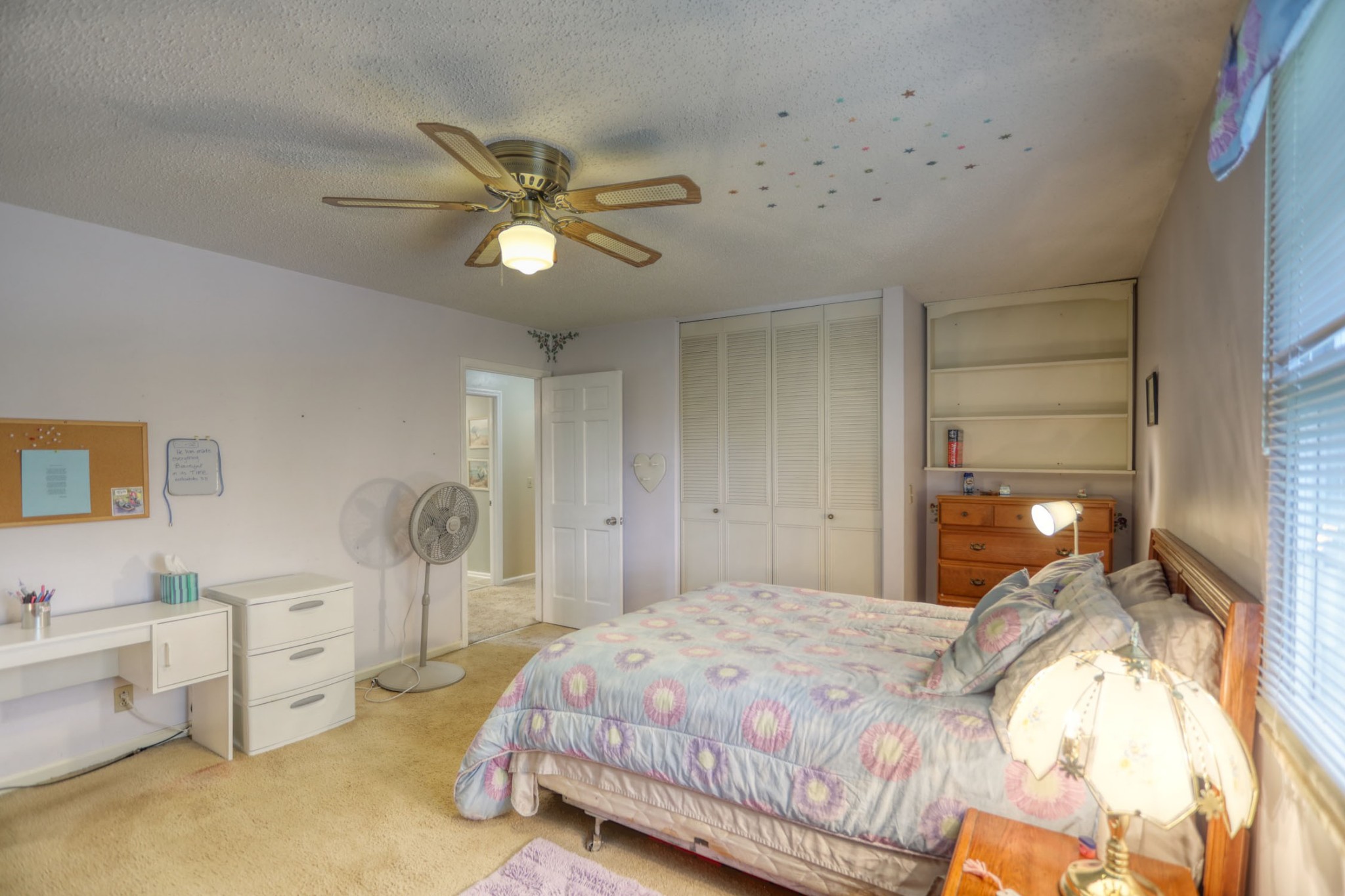 3517 Colony Point West Nashville, TN 37217 - Photo 17 of 34 a bedroom with a bed and a chandelier