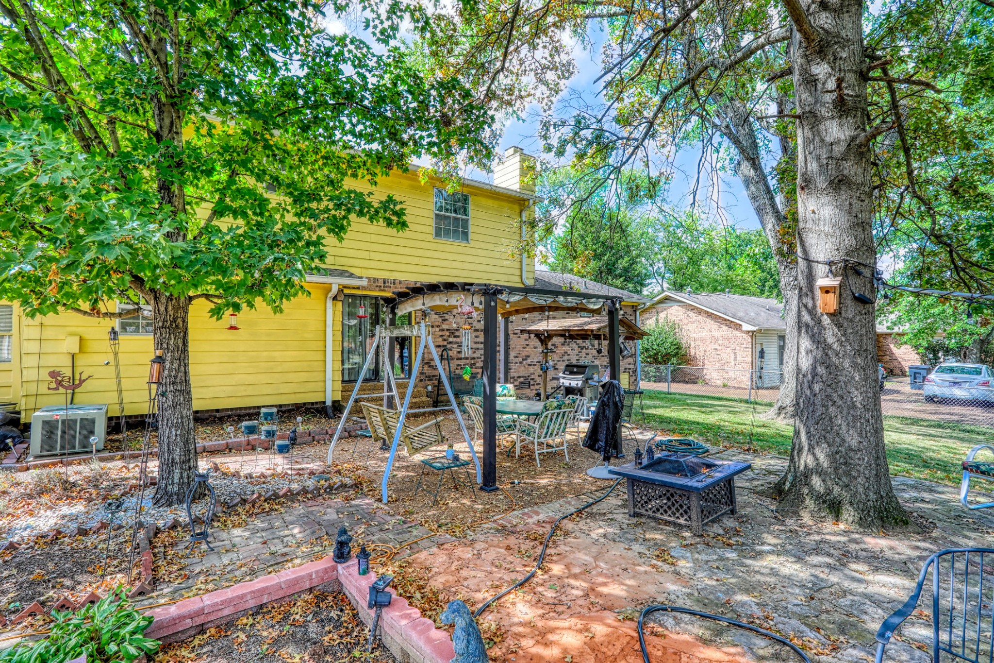 3517 Colony Point West Nashville, TN 37217 - Photo 33 of 34 a backyard of a house with barbeque oven table and chairs