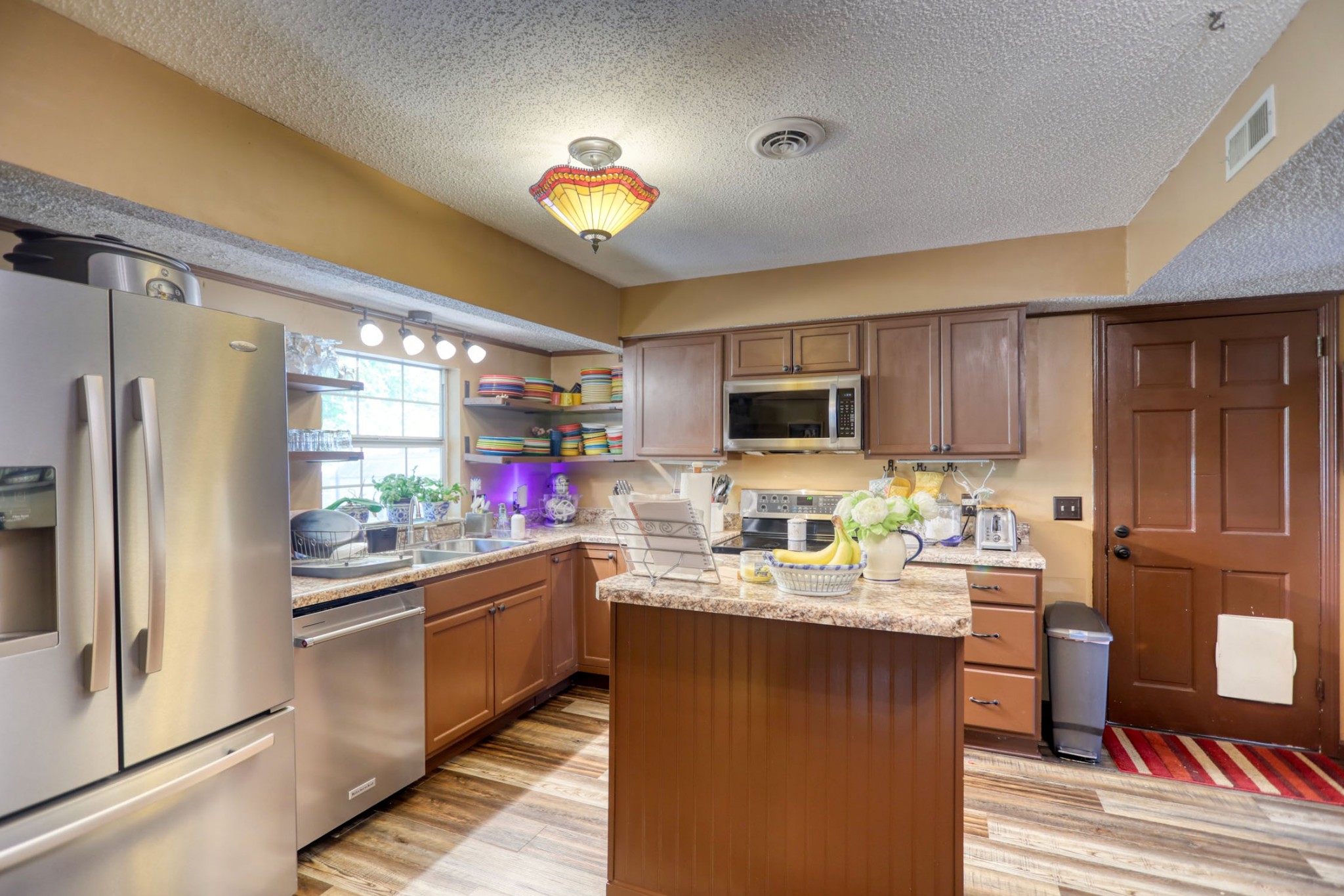 3517 Colony Point West Nashville, TN 37217 - Photo 7 of 34 a kitchen with a sink stove and refrigerator