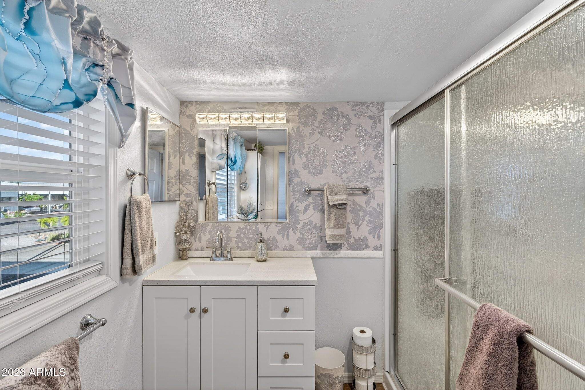 747 East Germann Road, Unit 54 San Tan Valley, AZ 85140 - Photo 17 of 26 a bathroom with a double vanity sink mirror and toilet