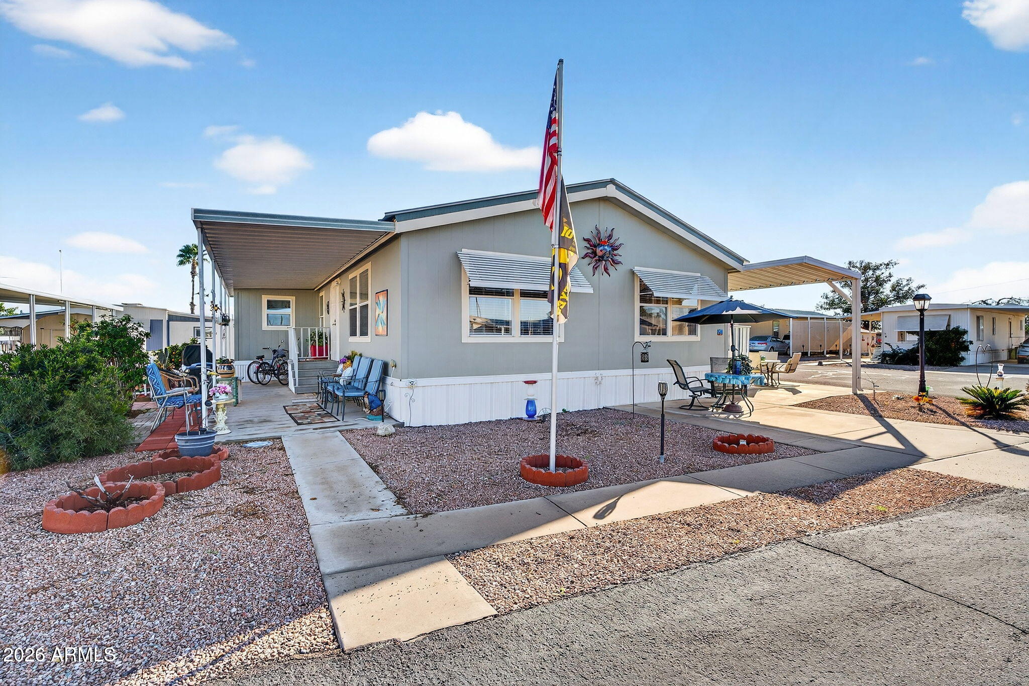 747 East Germann Road, Unit 54 San Tan Valley, AZ 85140 - Photo 23 of 26 a outdoor space with lots of tables and chairs