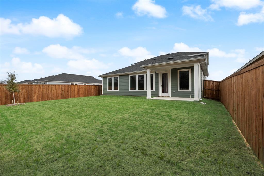 632 Marcus Lane Crowley, TX 76036 - Photo 31 of 34 a view of a house with backyard and garden