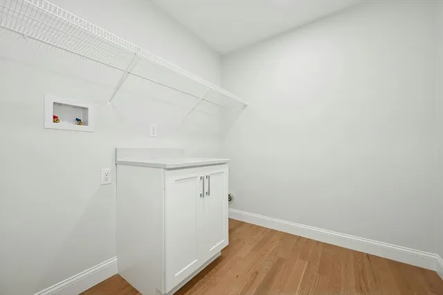 a view of hallway with closet