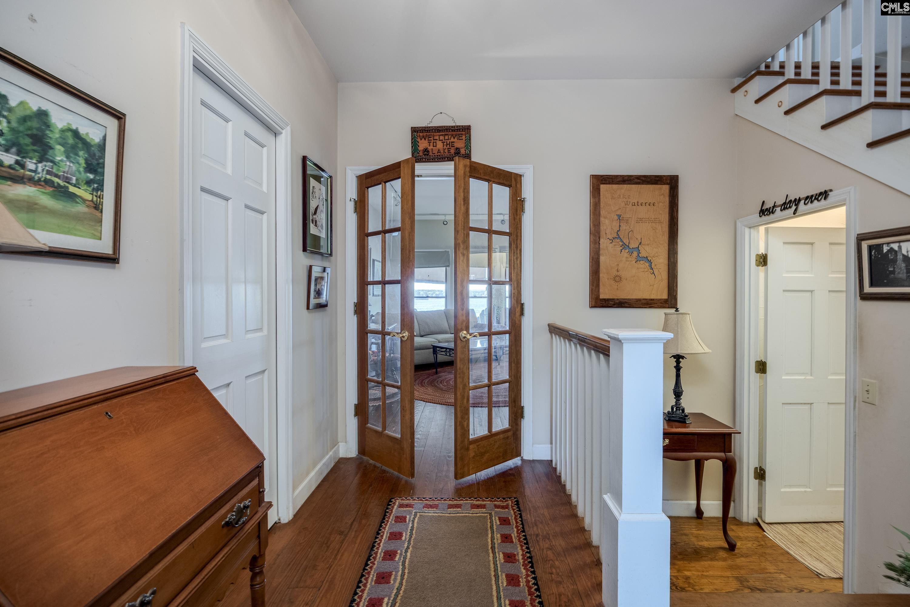 2577 Harbor View Road Camden, SC 29020 - Photo 12 of 42 a view of an entryway with wooden floor and livingroom