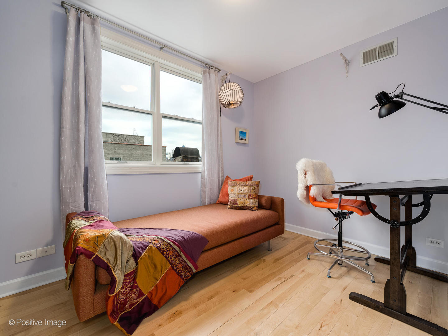 2039 West Rice Street, Unit 3 Chicago, IL 60622 - Photo 11 of 18 a bedroom with a bed and a window