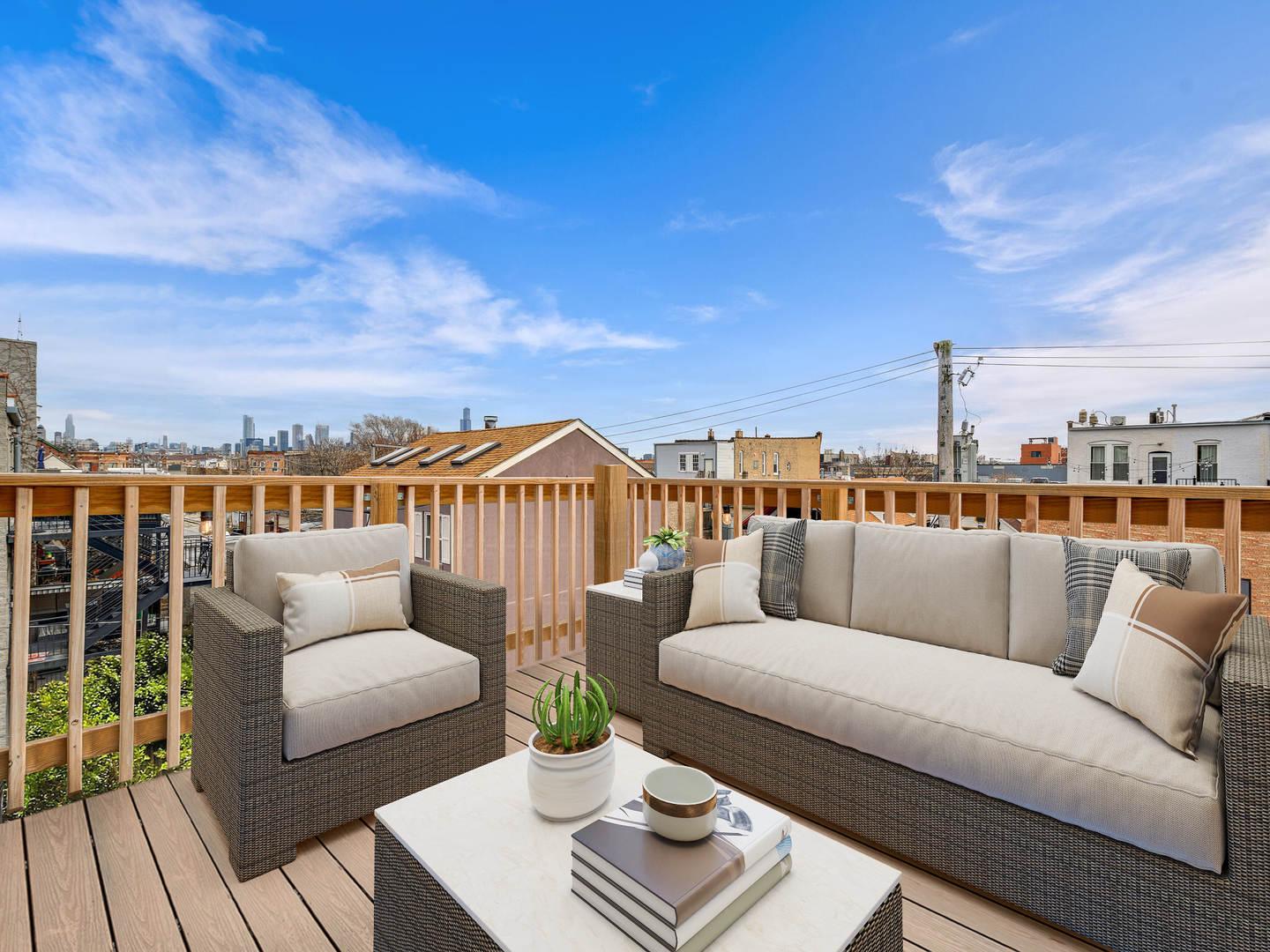 2039 West Rice Street, Unit 3 Chicago, IL 60622 - Photo 16 of 18 a roof deck with couches and city view