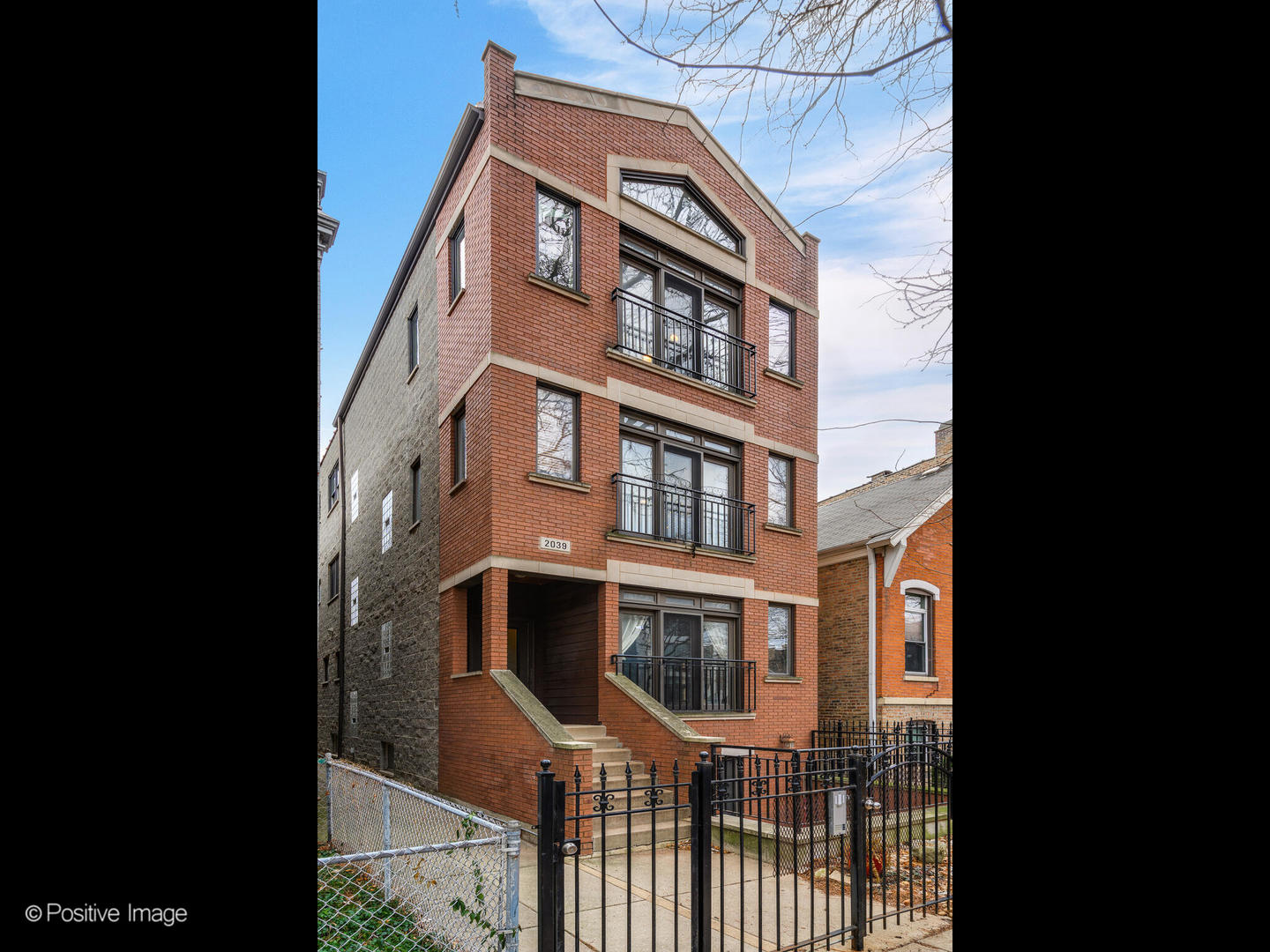 2039 West Rice Street, Unit 3 Chicago, IL 60622 - Photo 18 of 18 a front view of a multi story building