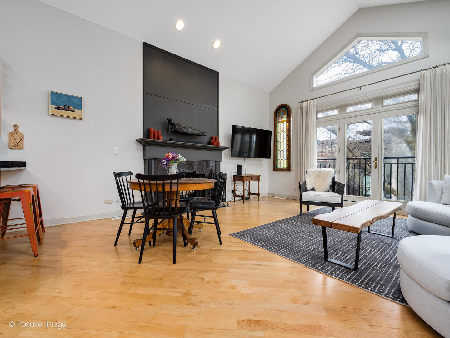 2039 West Rice Street, Unit 3 Chicago, IL 60622 - Photo 2 of 18 a living room with furniture and a large window