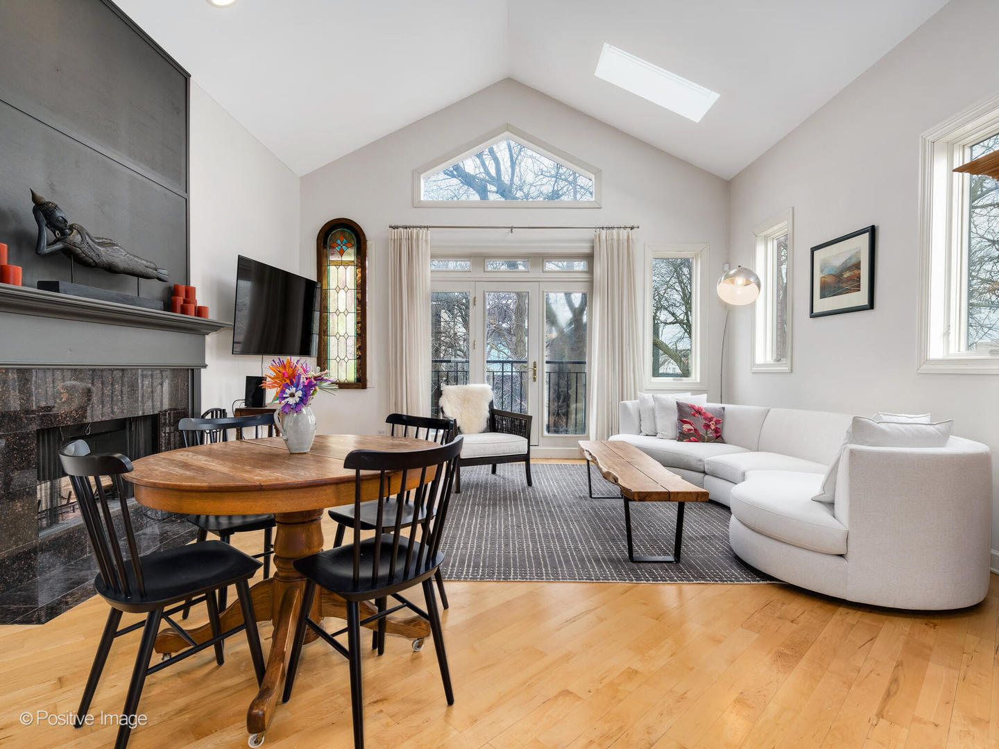 2039 West Rice Street, Unit 3 Chicago, IL 60622 - Photo 3 of 18 a view of a dining room with furniture window and wooden floor