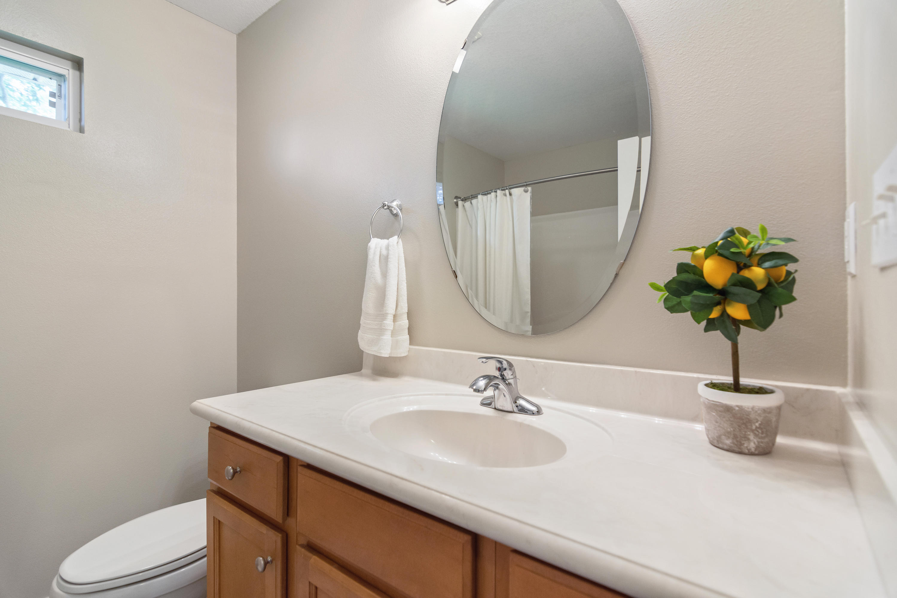 5780 Griffith Mill Road Baker, FL 32531 - Photo 28 of 50 a bathroom with a sink a toilet and a mirror