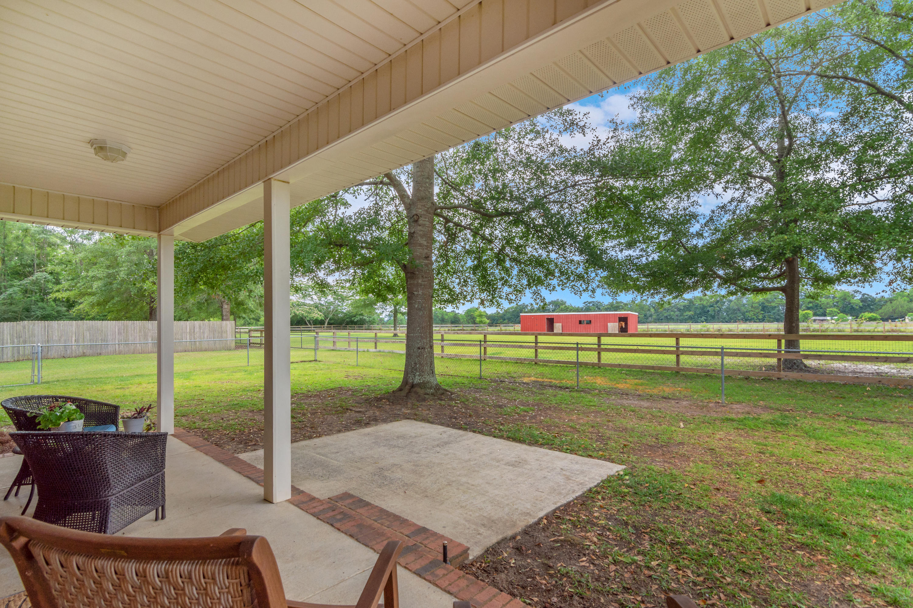 5780 Griffith Mill Road Baker, FL 32531 - Photo 34 of 50 a view of a house with a back yard