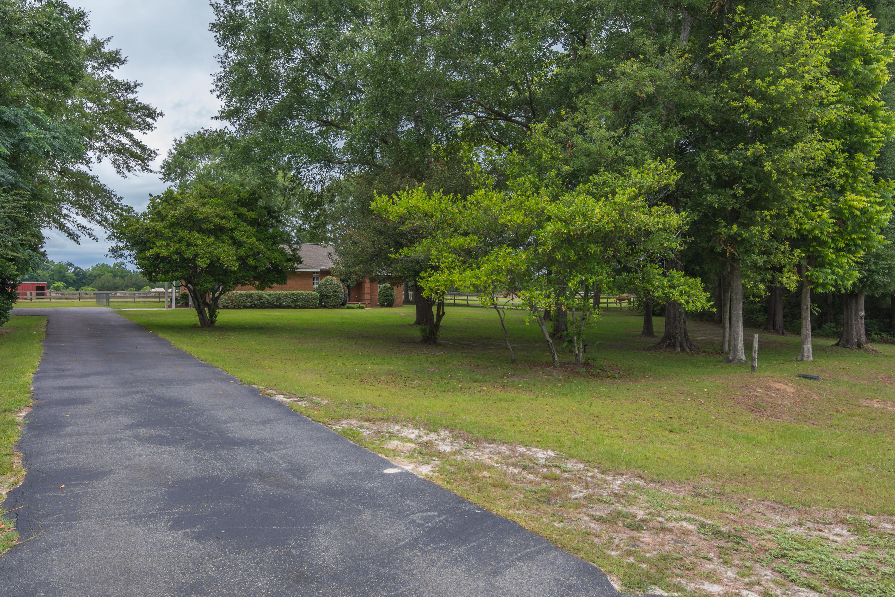 5780 Griffith Mill Road Baker, FL 32531 - Photo 41 of 50 a view of a patio with a yard