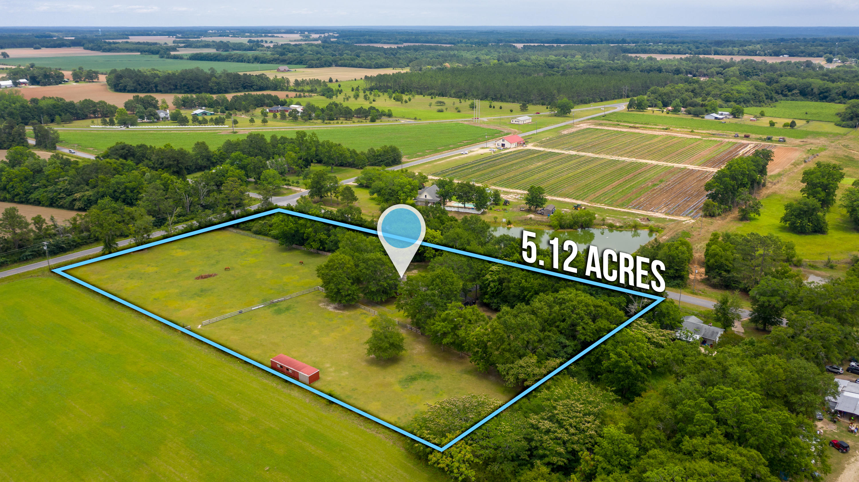 5780 Griffith Mill Road Baker, FL 32531 - Photo 46 of 50 an aerial view of a tennis court