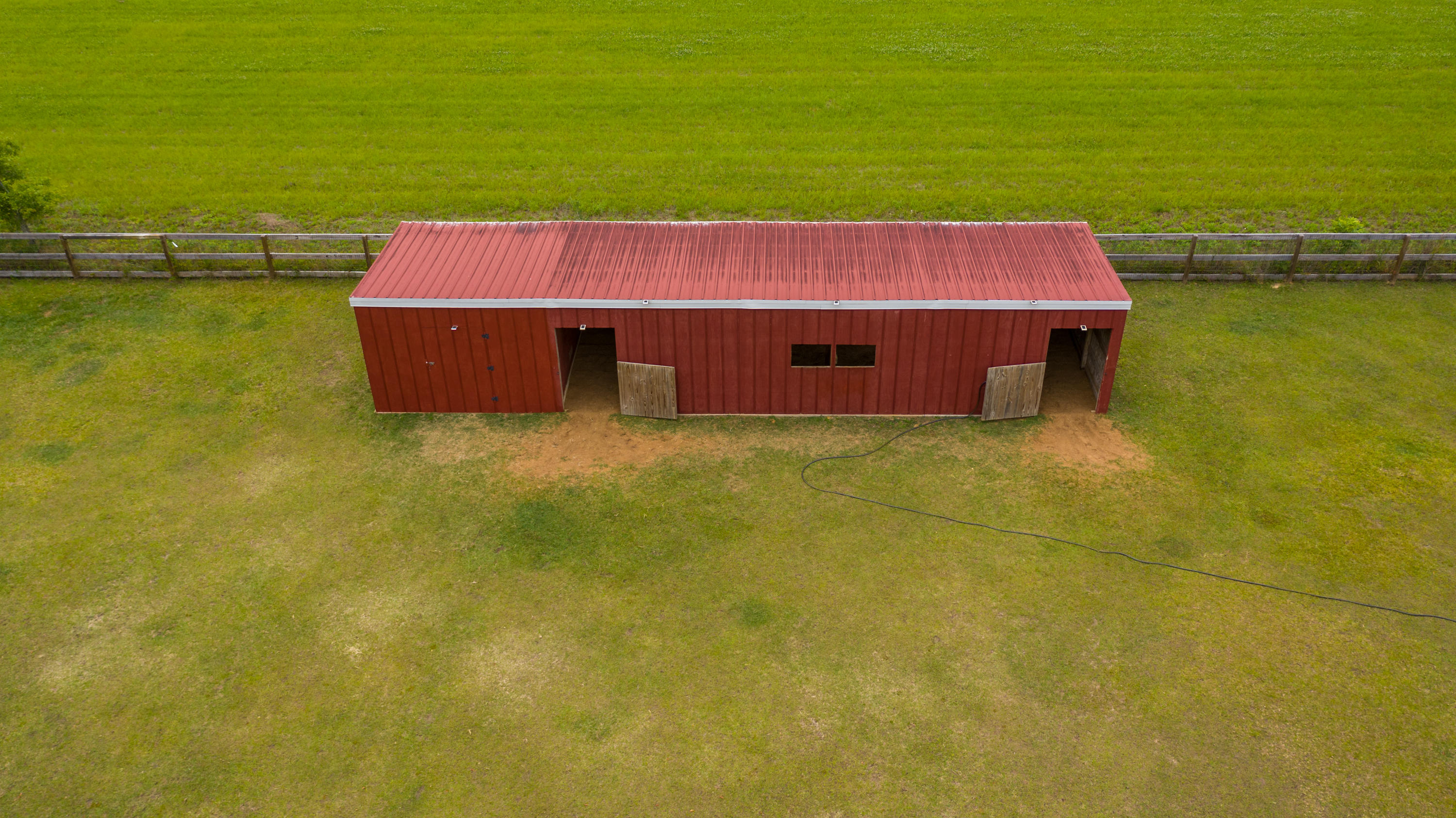 5780 Griffith Mill Road Baker, FL 32531 - Photo 48 of 50 an aerial view of a house with a yard