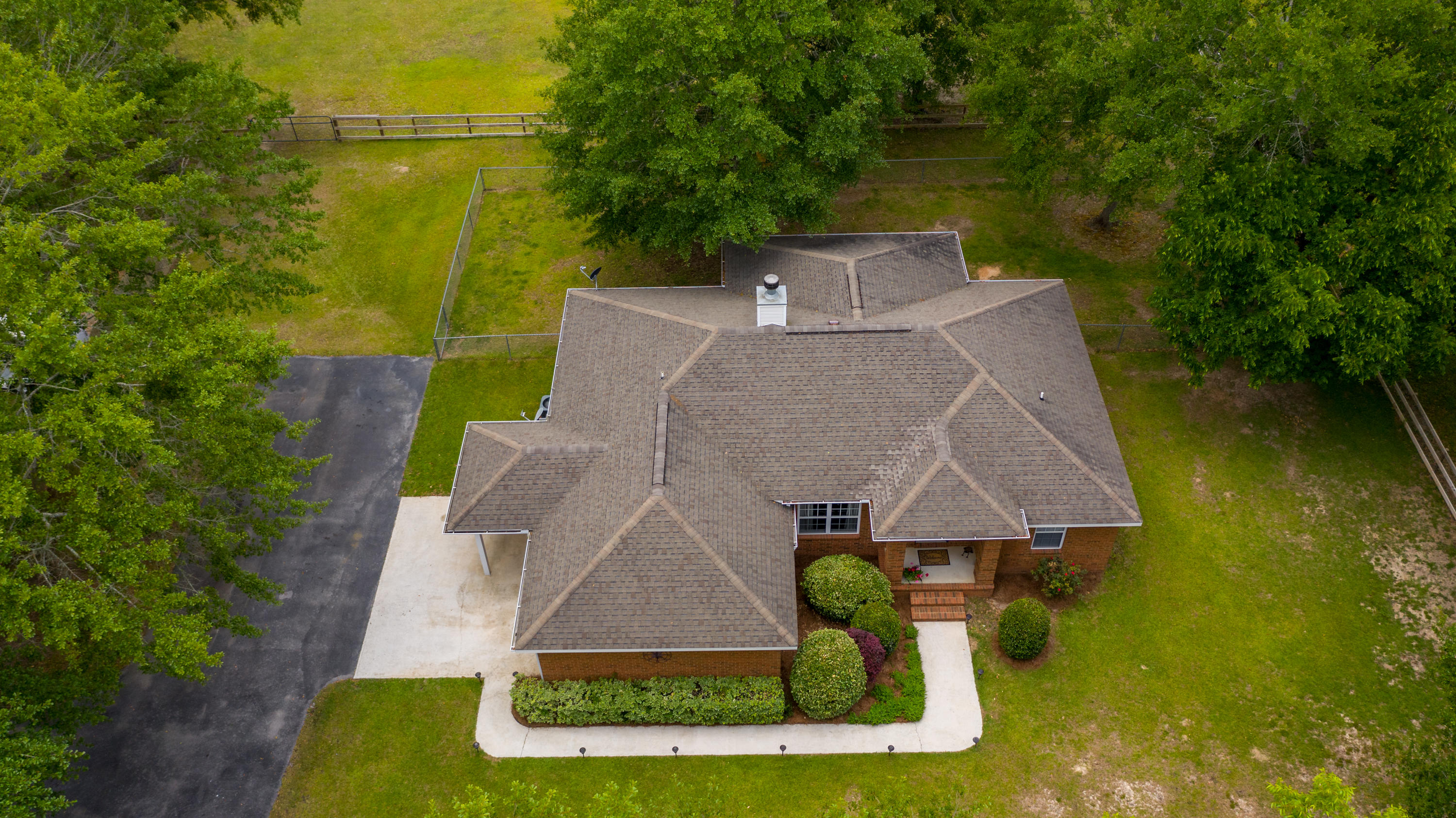 5780 Griffith Mill Road Baker, FL 32531 - Photo 50 of 50 an aerial view of a house with swimming pool and garden