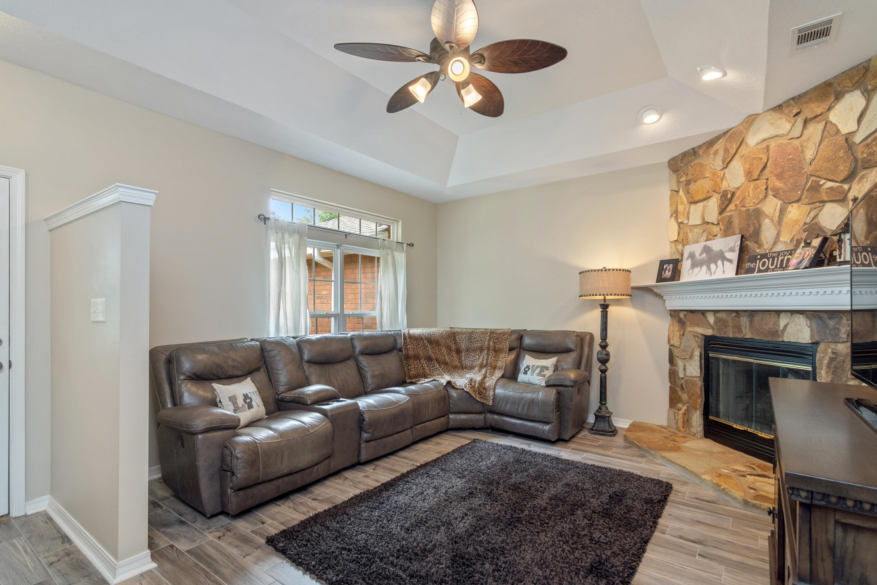 5780 Griffith Mill Road Baker, FL 32531 - Photo 9 of 50 a living room with furniture and a fireplace