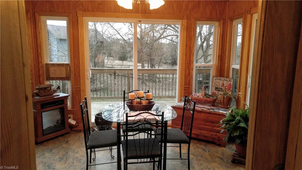 6251 Phillippi Road Julian, NC 27283 - Photo 11 of 30 Beautiful sunroom with heat and air!