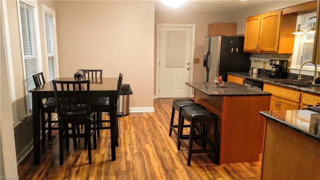 6251 Phillippi Road Julian, NC 27283 - Photo 6 of 30 Kitchen with granite countertops and island!