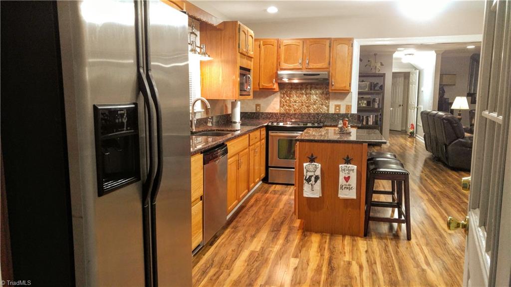 6251 Phillippi Road Julian, NC 27283 - Photo 7 of 30 All appliances stay! Including the refrigerator, washer and dryer! Laundry Room is to the left once you enter the kitchen from the garage.