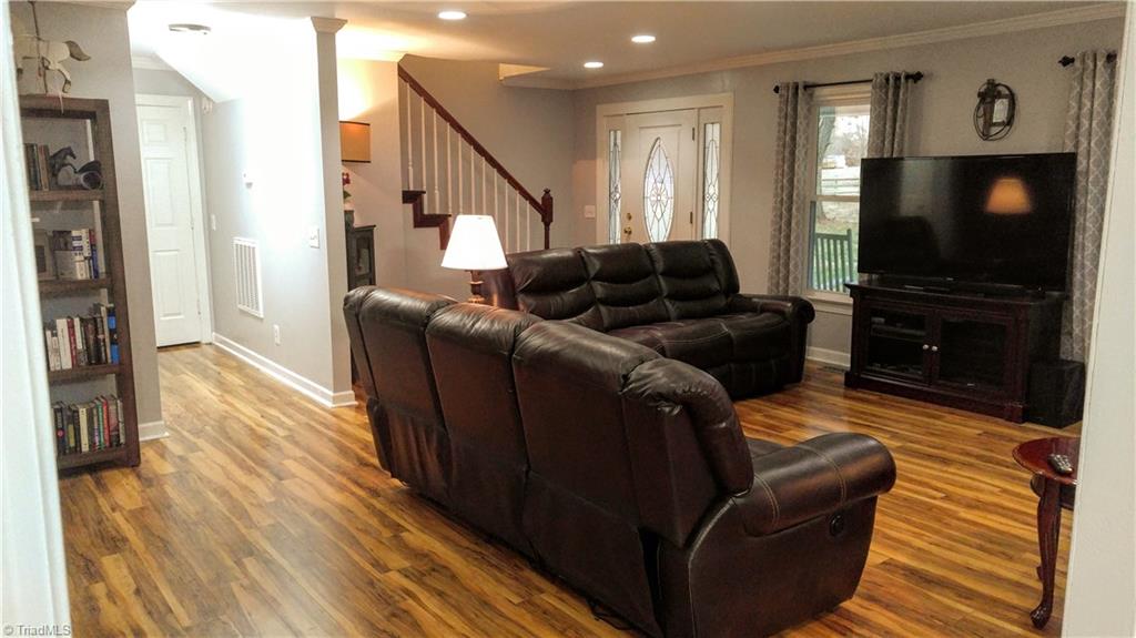 6251 Phillippi Road Julian, NC 27283 - Photo 9 of 30 Living Room, and down the hall is the 1/2 bath and master bedroom!