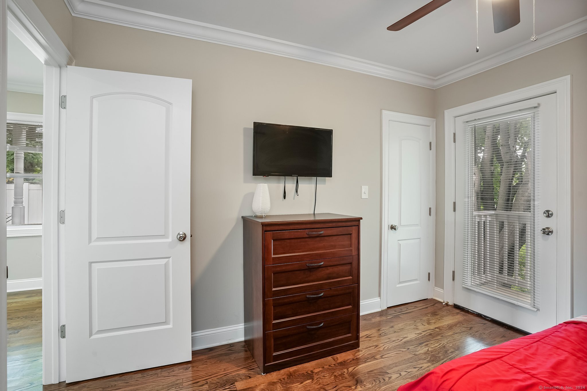 75 Hemlock Street Bridgeport, CT 06605 - Photo 14 of 24 a bedroom with a bed and a television