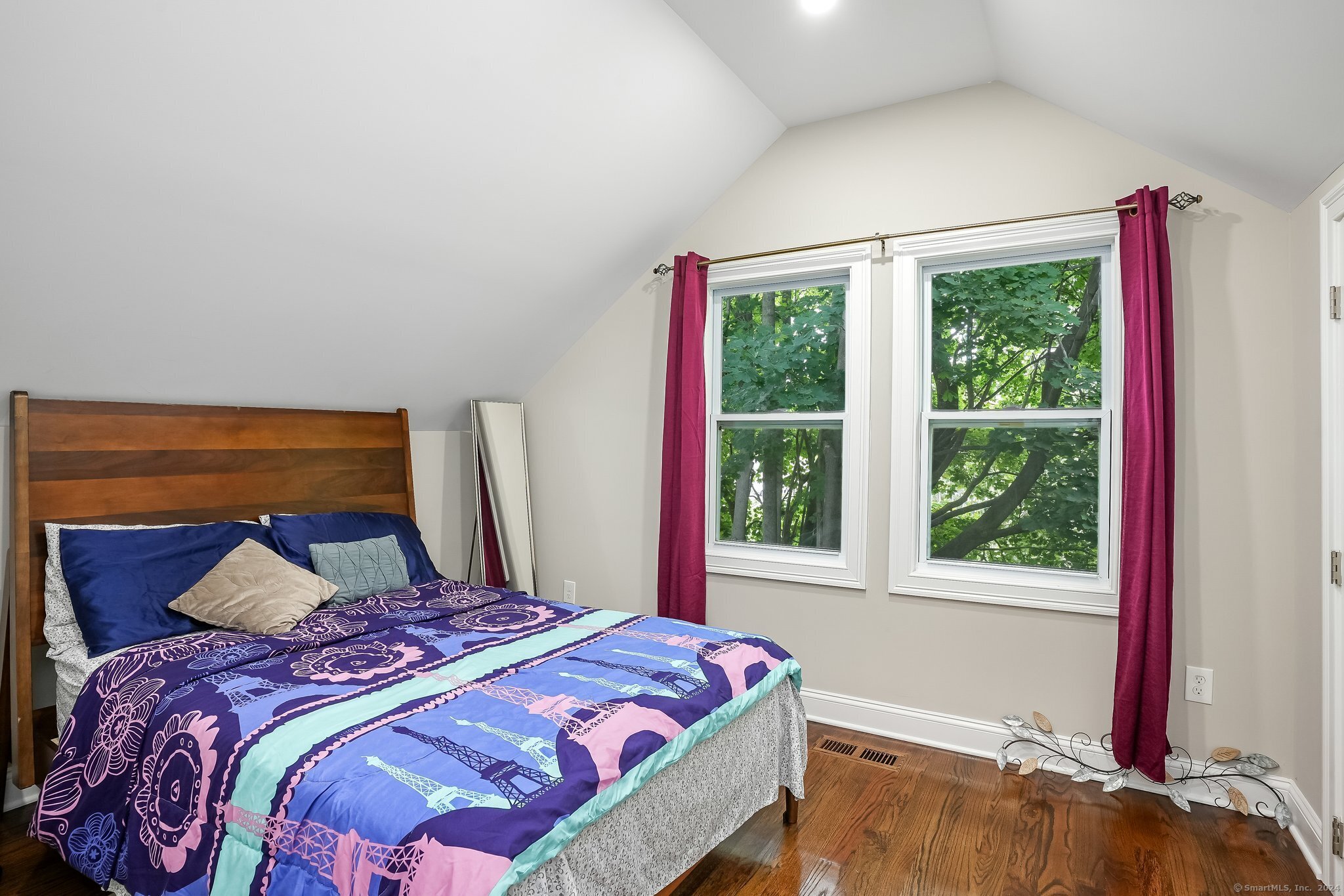 75 Hemlock Street Bridgeport, CT 06605 - Photo 18 of 24 a bedroom with a bed and a window