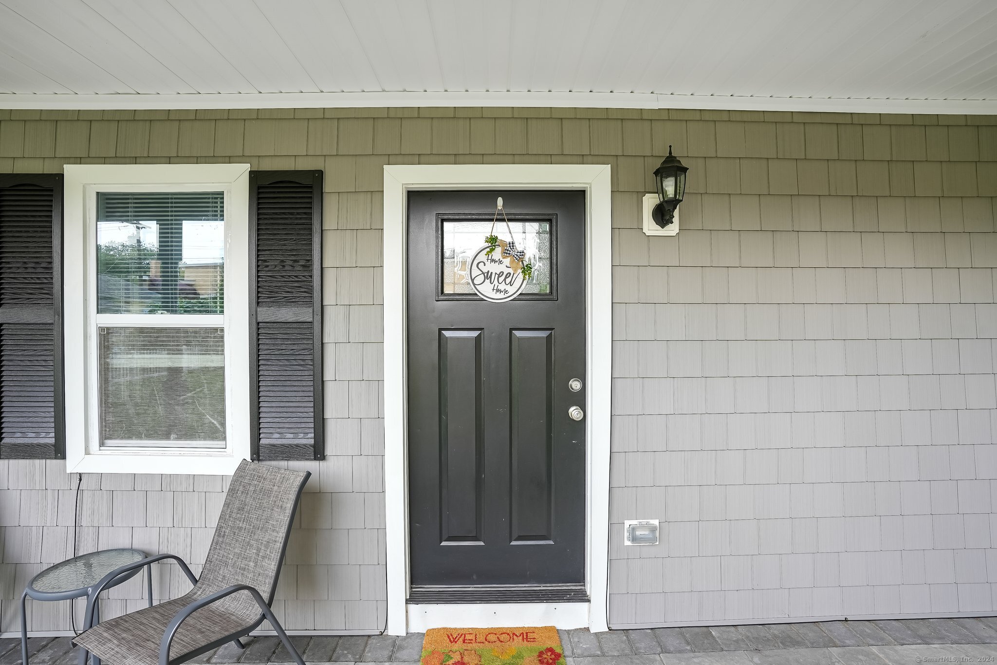 75 Hemlock Street Bridgeport, CT 06605 - Photo 4 of 24 a view of front door of house