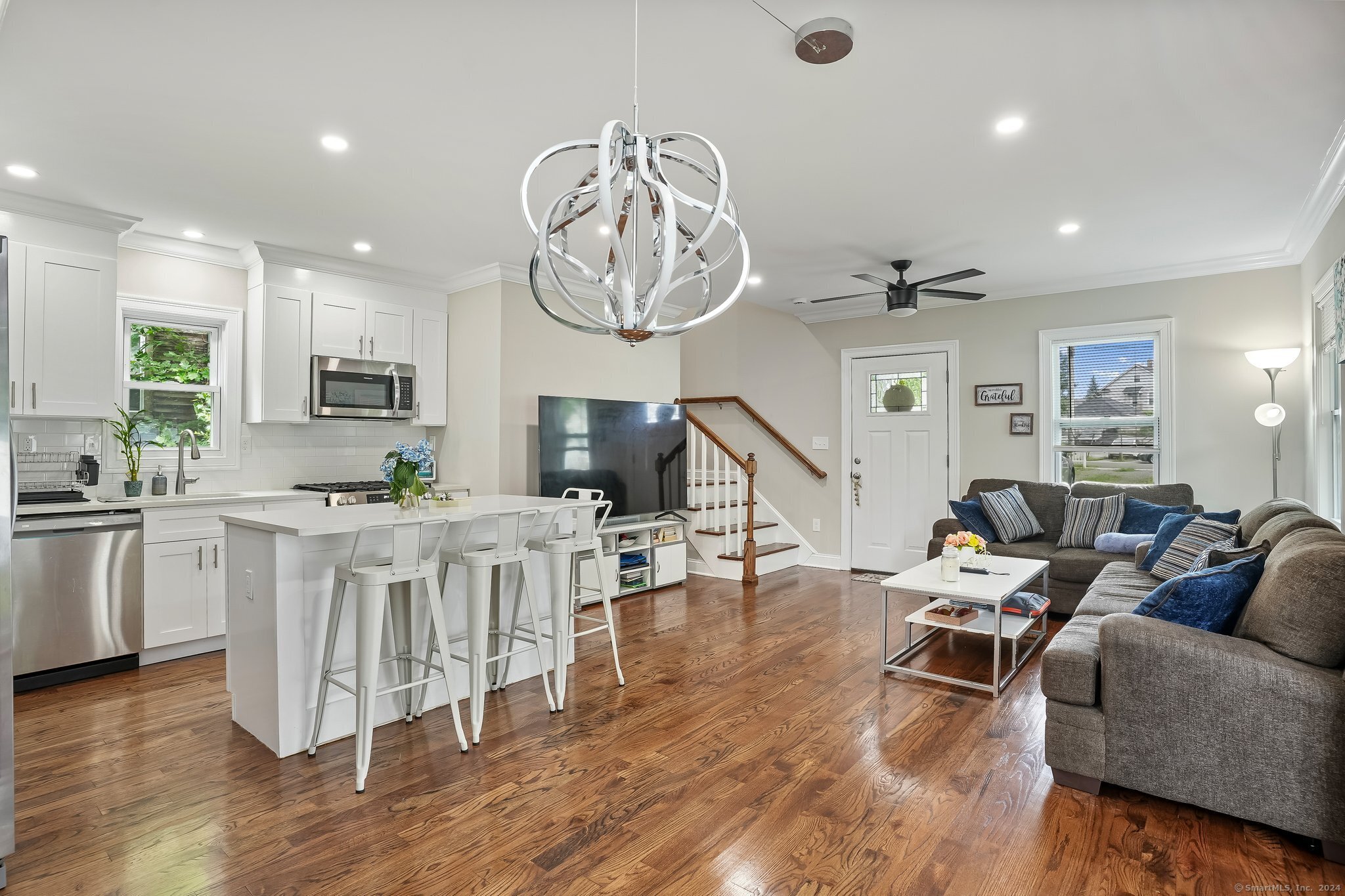 75 Hemlock Street Bridgeport, CT 06605 - Photo 9 of 24 a living room with furniture and kitchen view