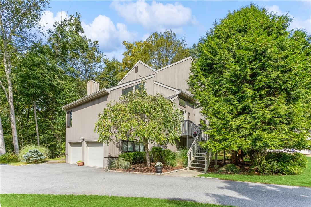 138 Mitchell Road Somers, NY 10589 - Photo 1 of 1 View of home's exterior featuring a garage