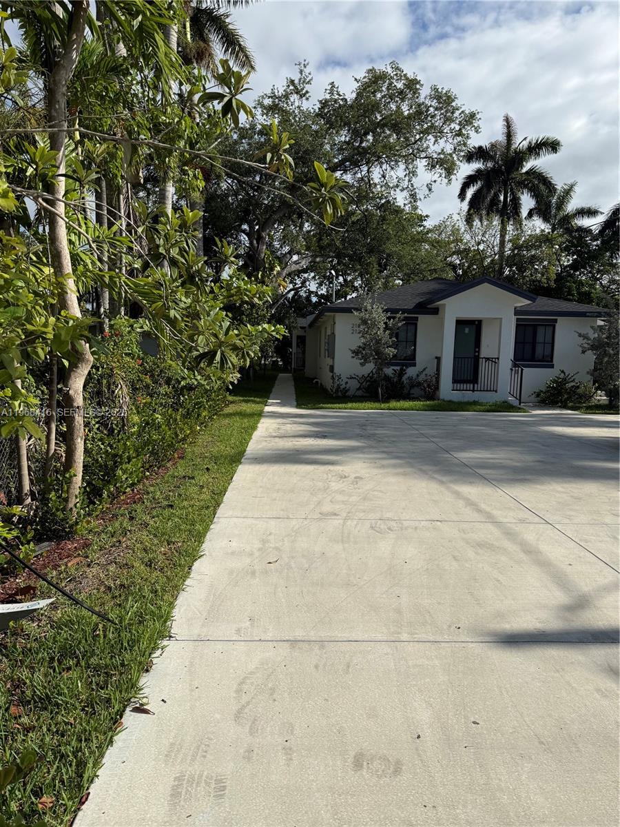 210 Southwest 3rd Street Florida City, FL 33034 - Photo 3 of 15 a house with a yard
