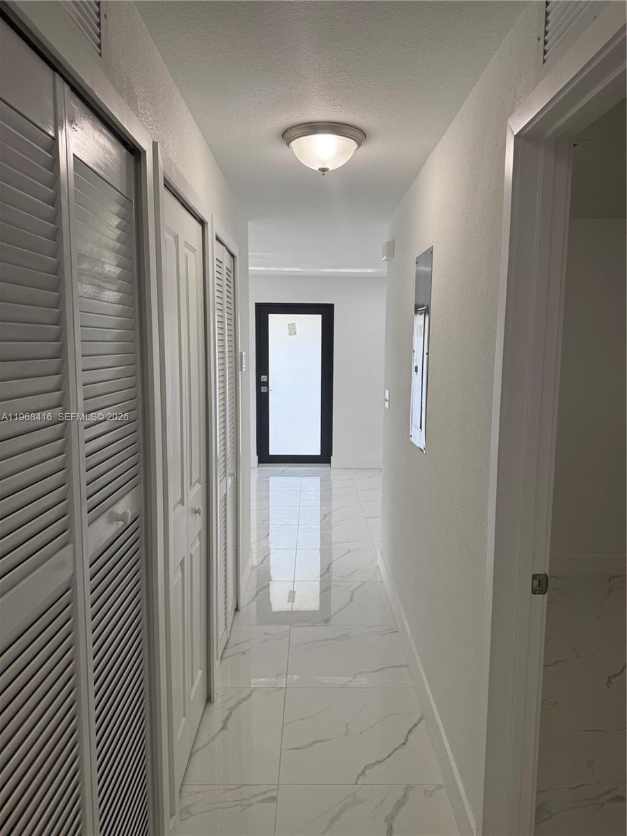 210 Southwest 3rd Street Florida City, FL 33034 - Photo 10 of 15 a view of a hallway