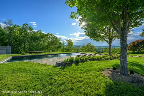 a view of lake with green space