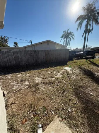 a view of a backyard of a house