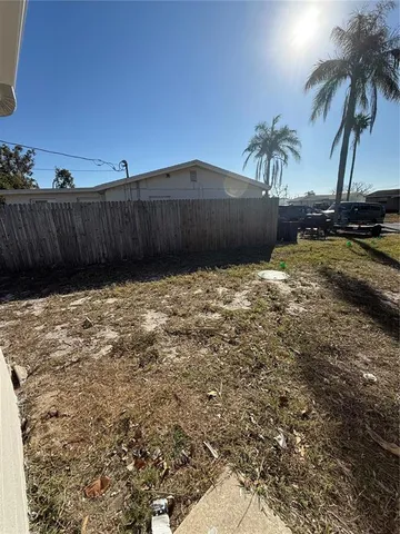 a view of a backyard of a house