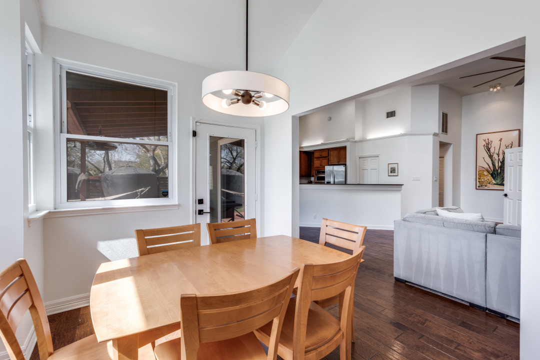 1113 Taulbee Lane Austin, TX 78757 - Photo 13 of 35 a view of a dining room with furniture and wooden floor