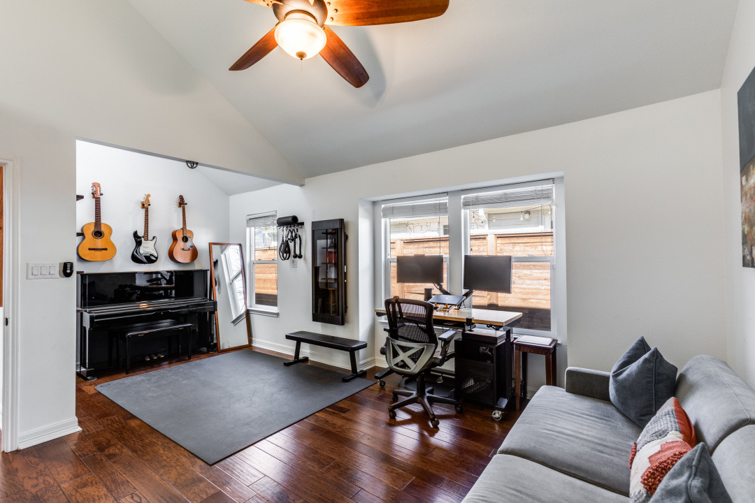 1113 Taulbee Lane Austin, TX 78757 - Photo 20 of 35 a living room with furniture and wooden floor