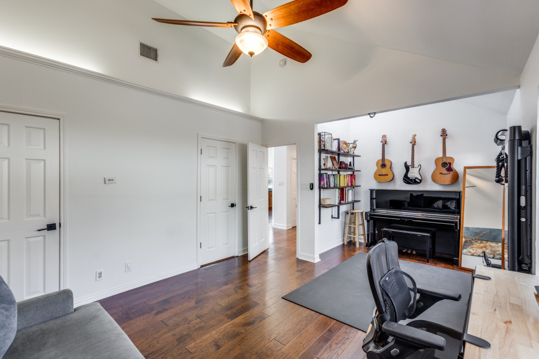 1113 Taulbee Lane Austin, TX 78757 - Photo 21 of 35 a view of a workspace with furniture and wooden floor