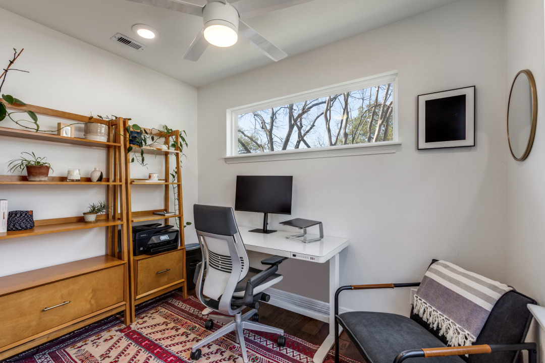 1113 Taulbee Lane Austin, TX 78757 - Photo 22 of 35 a view of a workspace with furniture