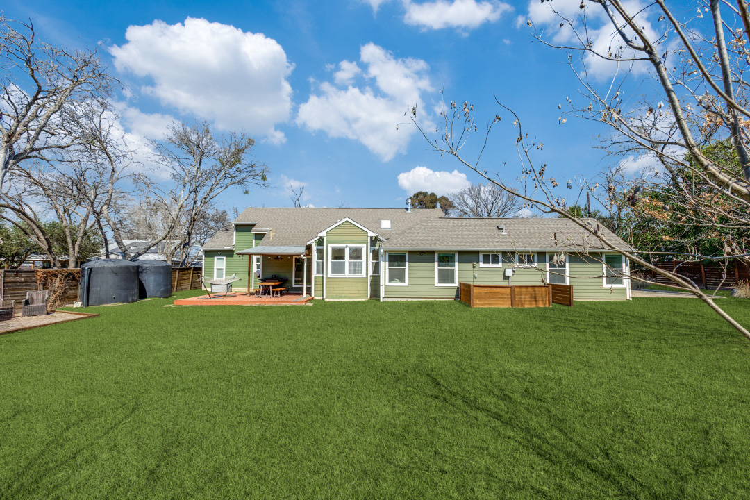 1113 Taulbee Lane Austin, TX 78757 - Photo 33 of 35 a view of a house with a big yard