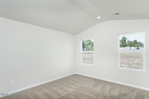 64 Rider Street Broadway, NC 27505 - Photo 6 of 11 an empty room with windows