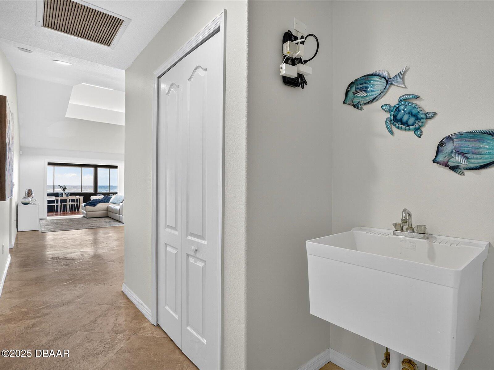 4707 South Atlantic Avenue Ponce Inlet, FL 32127 - Photo 34 of 43 Garage Hallway