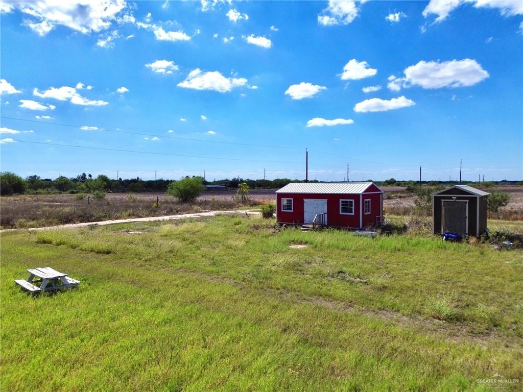 10220 Big 5 Road Edinburg, TX 78541 - Photo 14 of 16 a view of a backyard with swimming pool