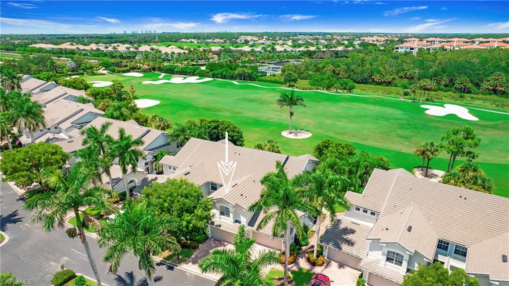 6025 Pinnacle Lane, Unit 6602 Naples, FL 34110 - Photo 28 of 43 an aerial view of a city
