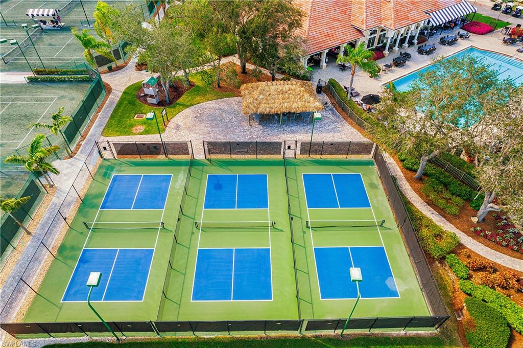 6025 Pinnacle Lane, Unit 6602 Naples, FL 34110 - Photo 42 of 43 a view of an outdoor space with seating area