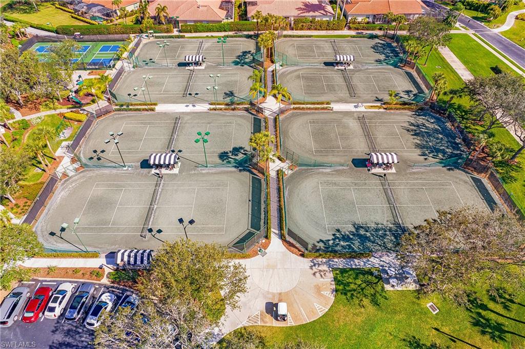 6025 Pinnacle Lane, Unit 6602 Naples, FL 34110 - Photo 43 of 43 an aerial view of a house with a yard