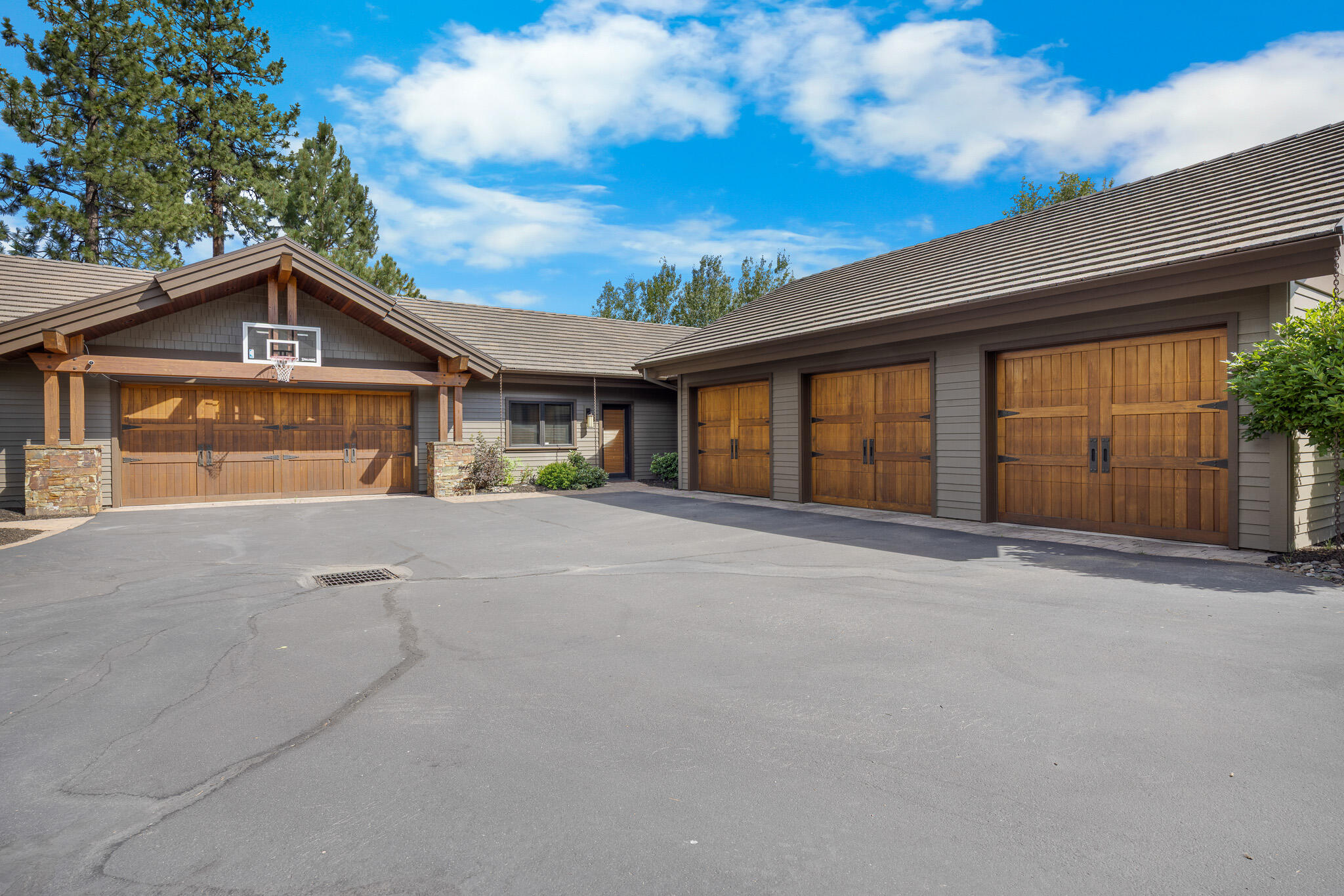 18883 Sutherland Court Bend, OR 97702 - Photo 54 of 70 Three heated garages provide ample space for up to nine vehicles with plenty of room for adventure gear.