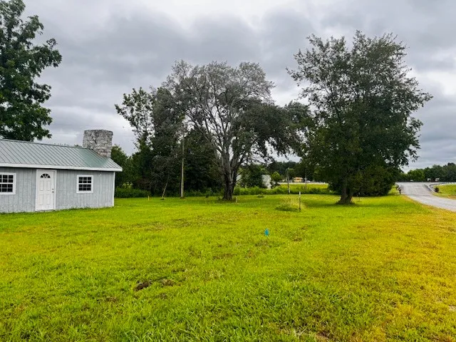 a view of a house with a big yard